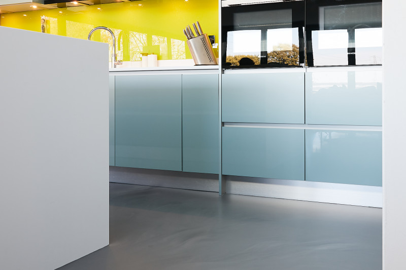 resin flooring underfloor heating in a residential kitchen